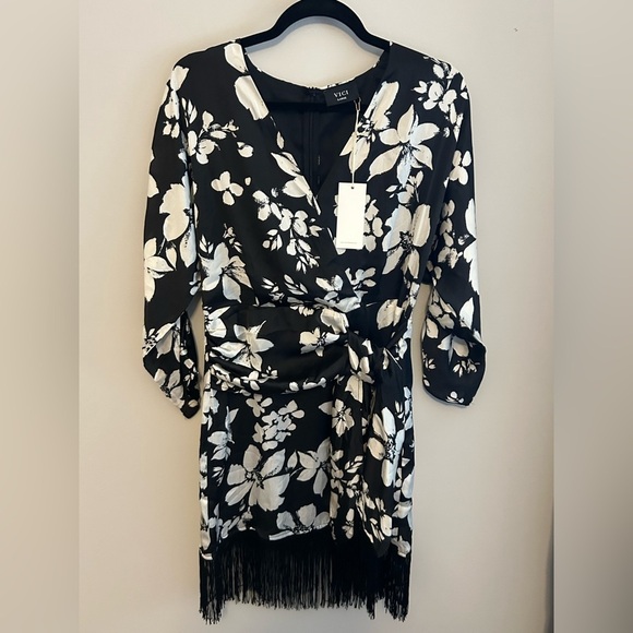 Vici Dresses & Skirts - NWT VICI black and white floral long sleeve mini fringe wrap Dress